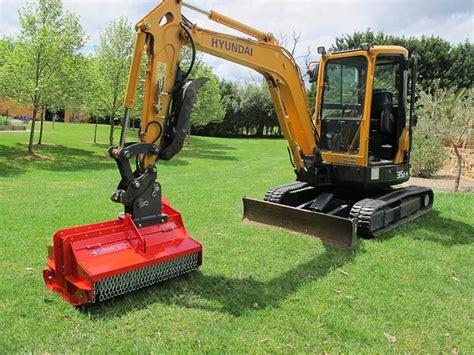 mulcher attachment for mini excavator|mini excavator with mulching head.